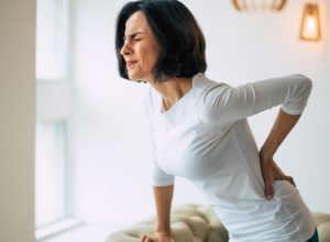 natural pain relief: woman with chronic pain