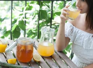 Woman drinking kombucha mocktail