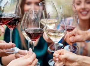 WOMEN DRINKING ANTI-INFLAMMATORY WINE